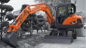 Колесный экскаватор Doosan DX 55W – фото 1
