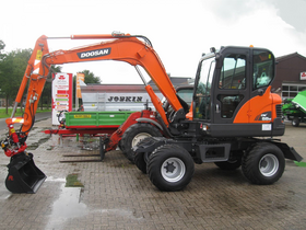 Колесный экскаватор Doosan DX 55W – фото 2