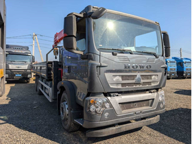 Бортовой грузовик на шасси HOWO ТХ 6x4 с КМУ SUNHUNK S 1606 – фото 1